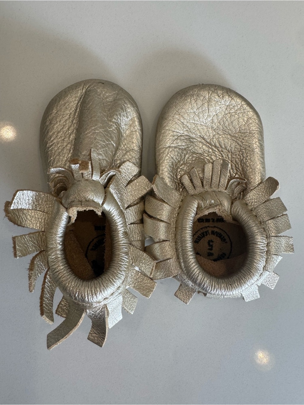 Freshly Picked Metallic Gold Fringe Baby Moccasins